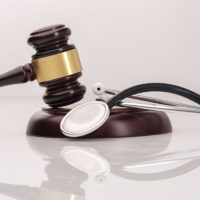 gavel on top of stethoscope to conceptualize medical malpractice