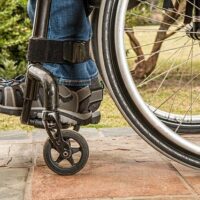 Image of a wheelchaired person’s feet, representing how a West Virginia Social Security disability attorney at Burke, Schultz, Harman & Jenkinson can help you secure benefits.